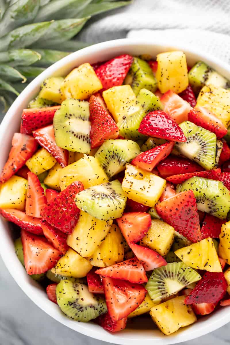 Bird's eye view of Summer Fruit Salad in a white bowl.