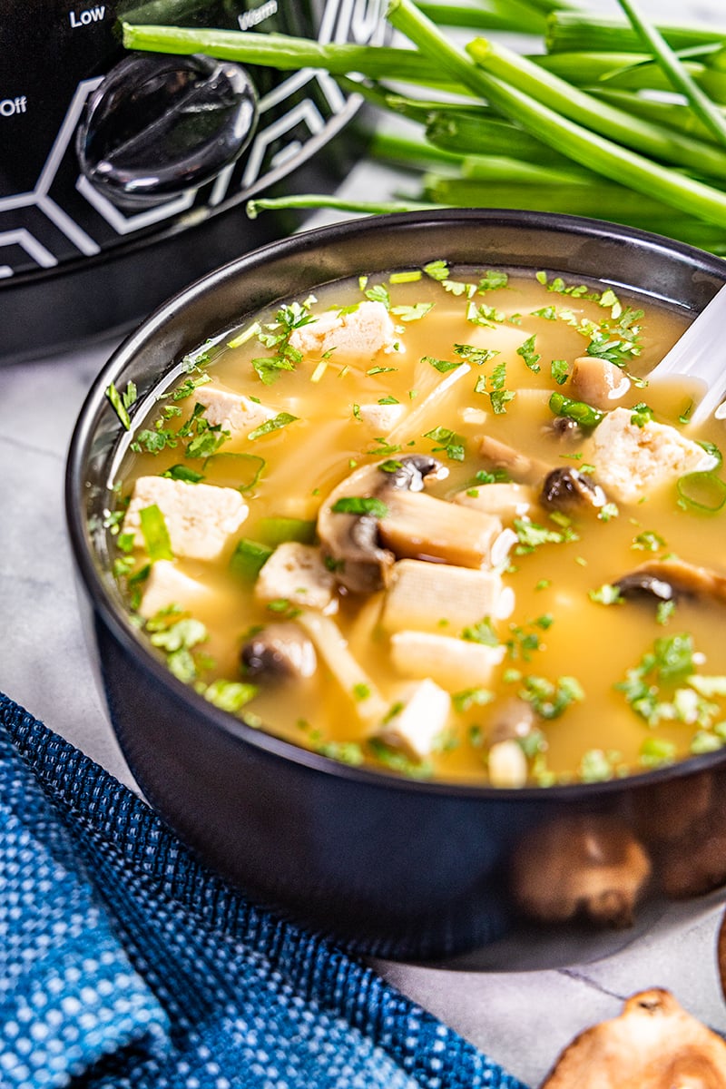 Close up view of a bowl of Chinese hot and sour soup.