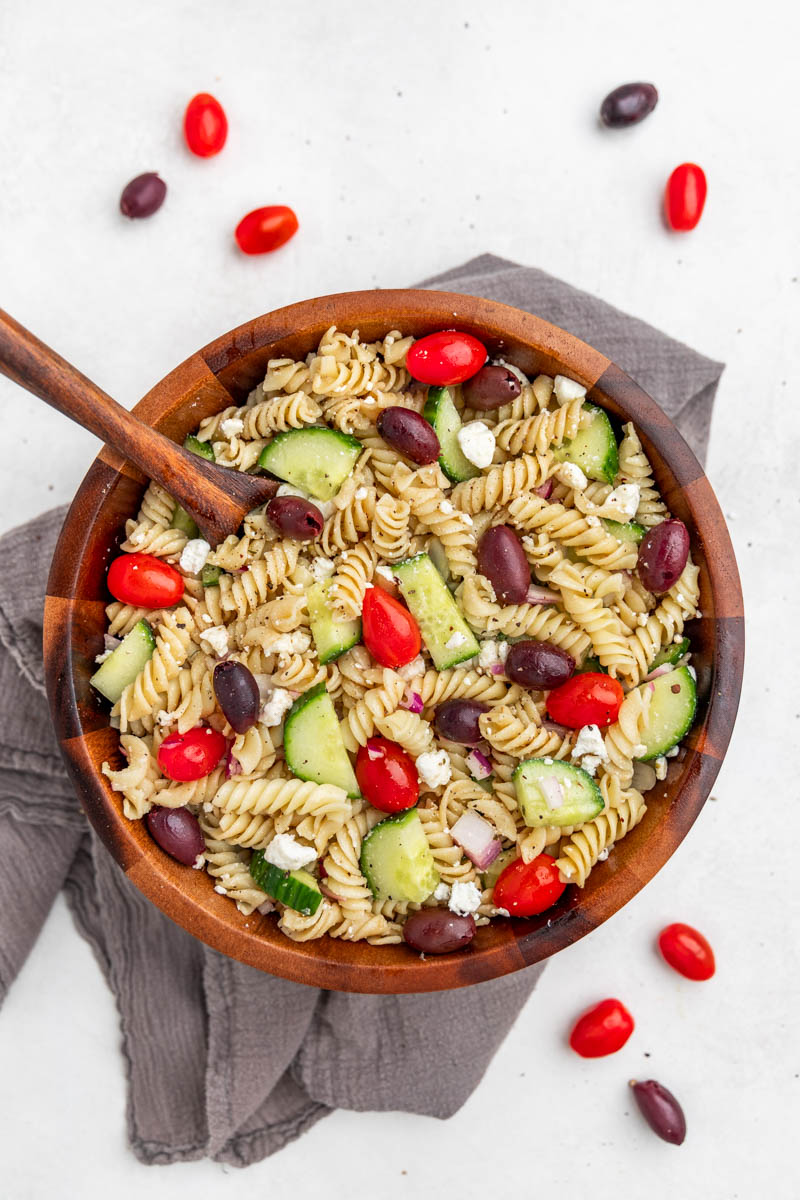 Overhead view of greek pasta salad.