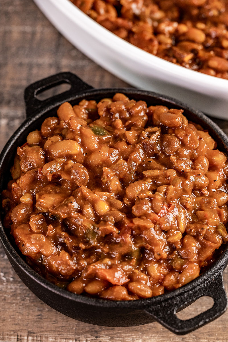 Overhead view of a serving of baked beans.