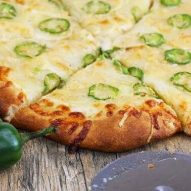 Jalapeno Scalloped Potato Pizza on a wood countertop