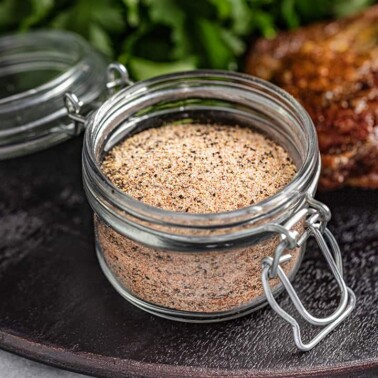 glass jar opened full of steak seasoning