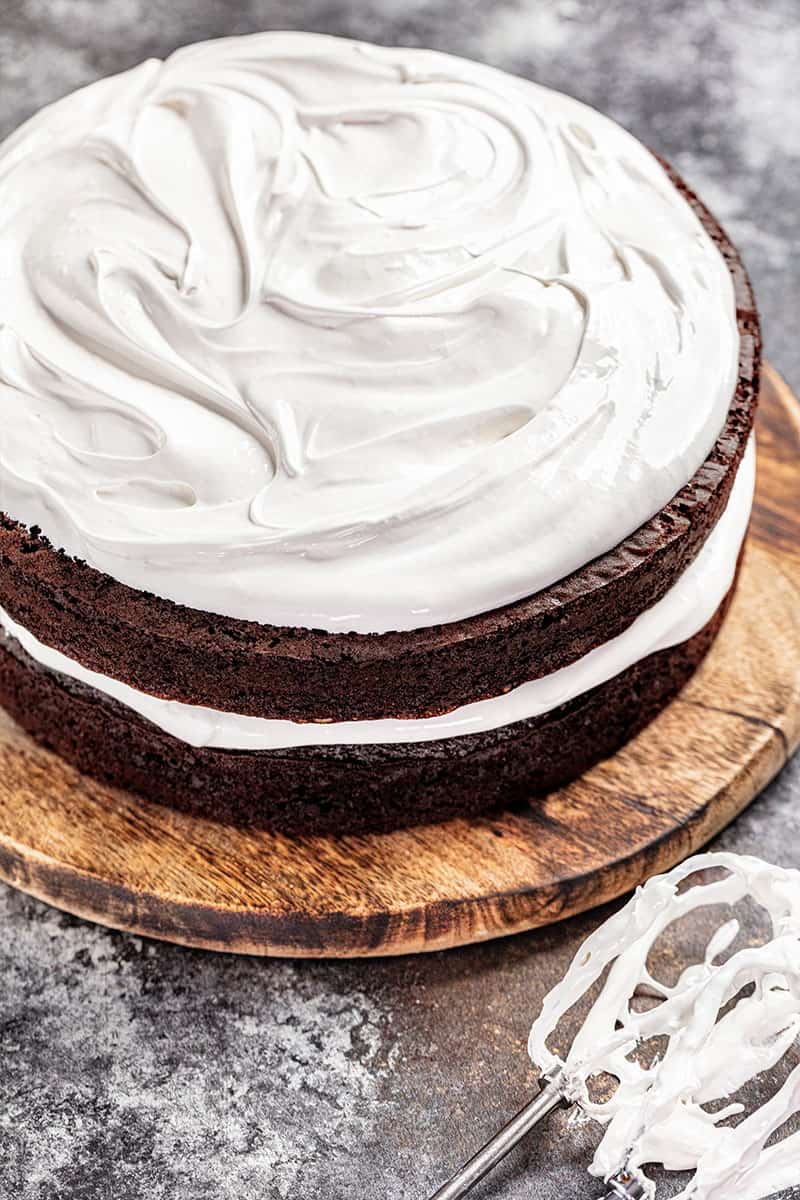 Overhead view of a chocolate cake with 7 minute frosting.