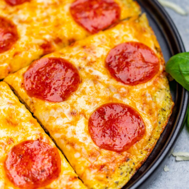 Close up view of cauliflower pizza crust pizza.